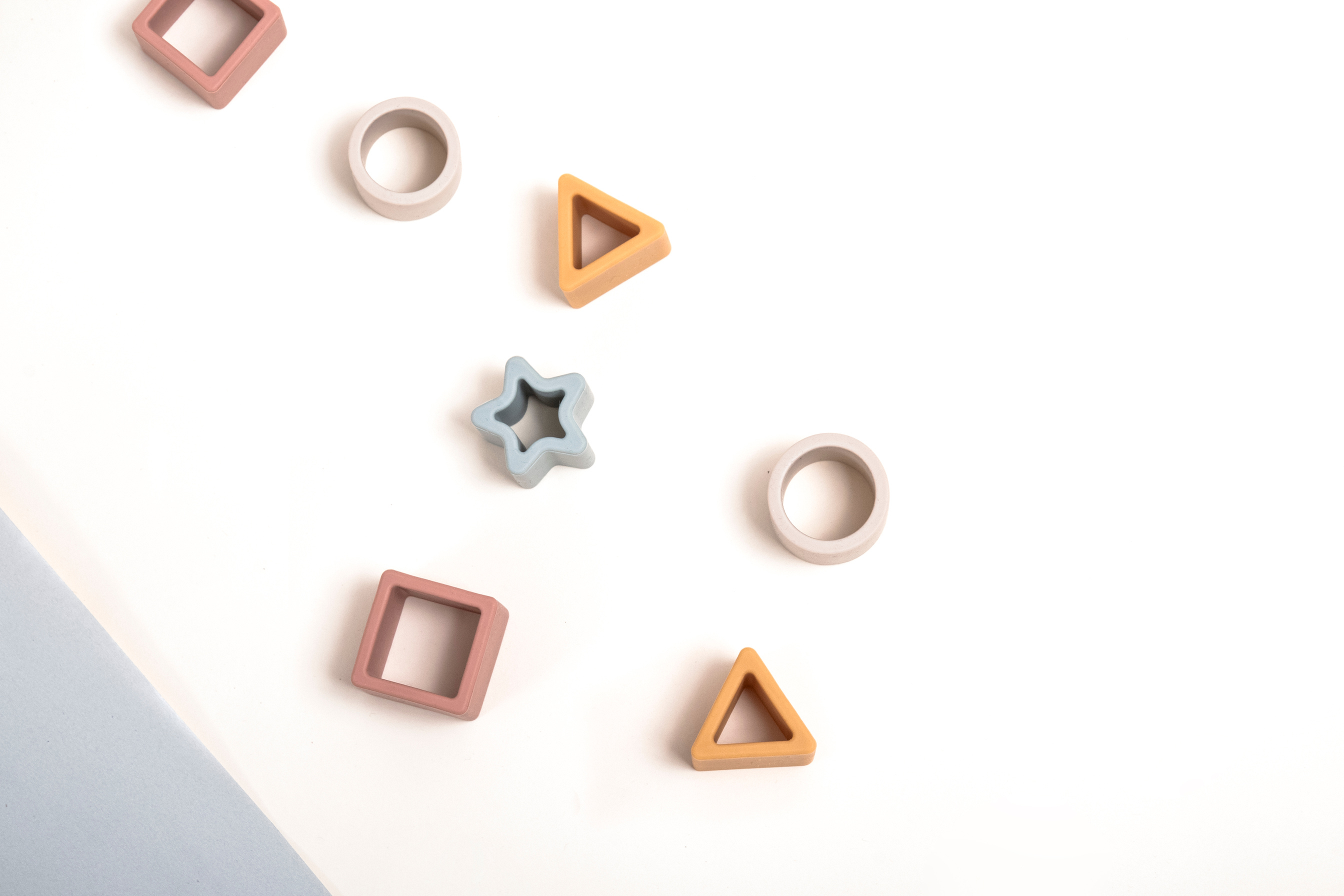 Wooden Toy Shapes on White Background 